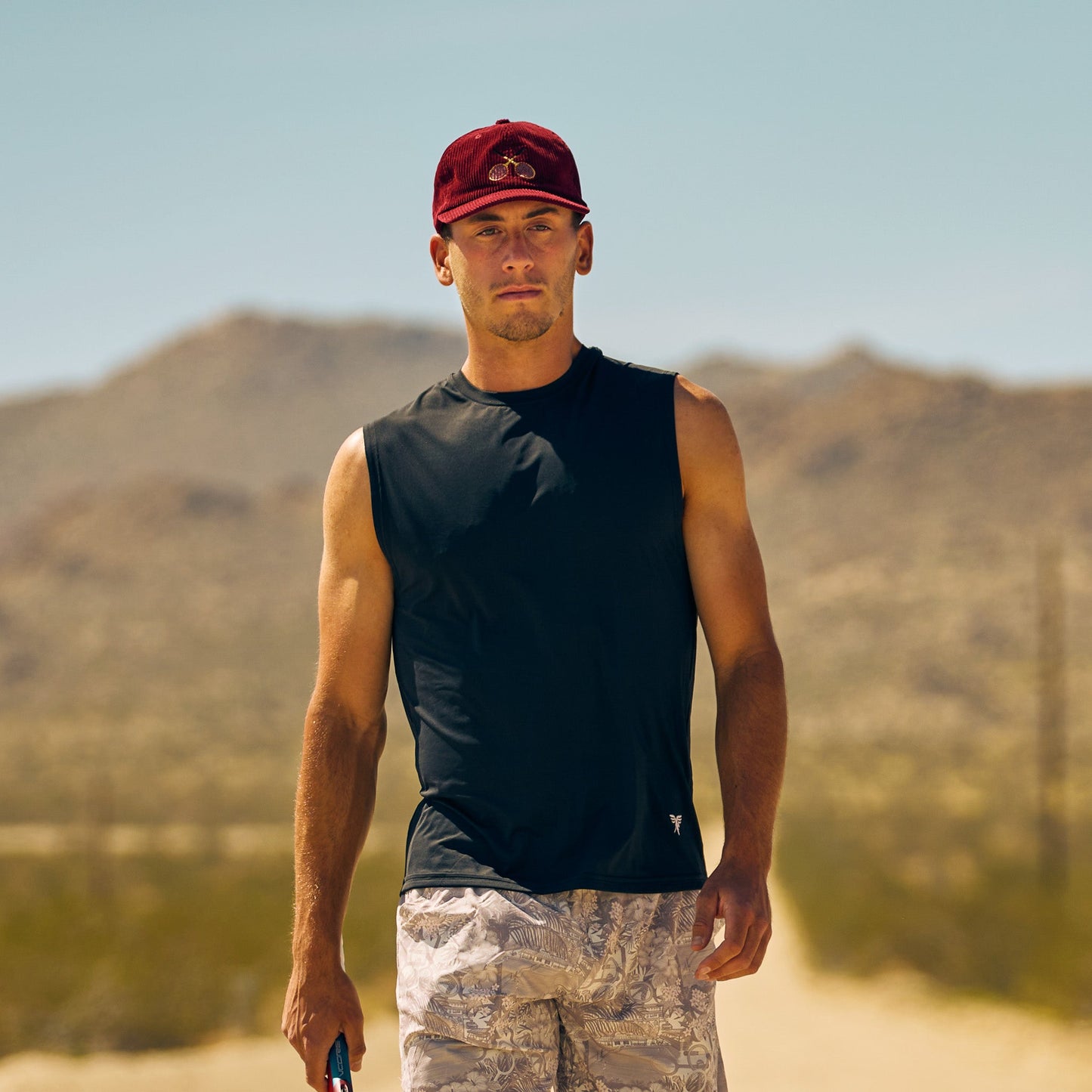 Model wearing Sigrún men's tank top in black.