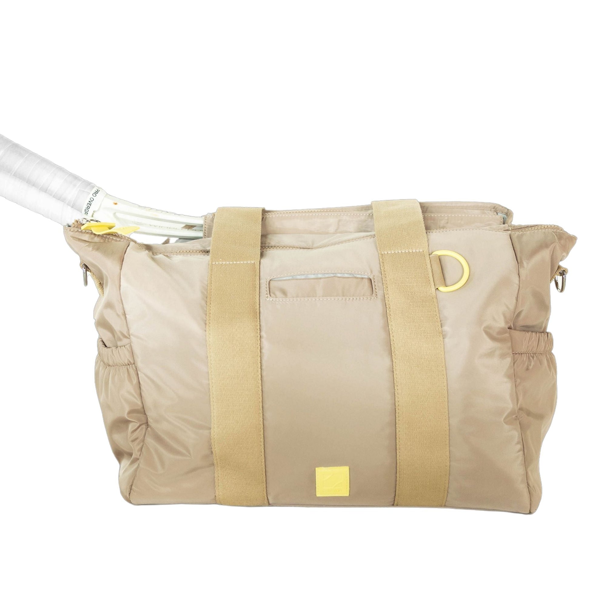 Beige duffel bag with yellow accents on a white background