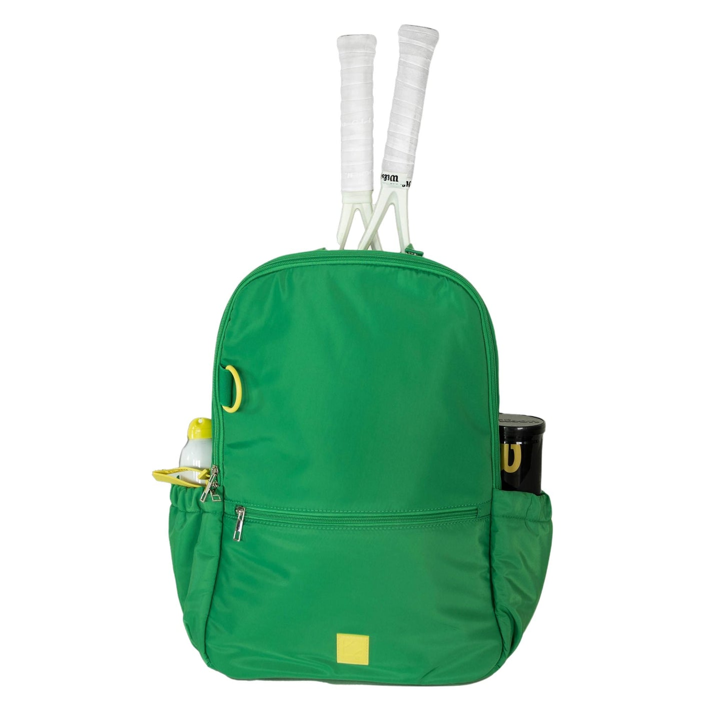 Green backpack with tennis rackets and accessories on a white background
