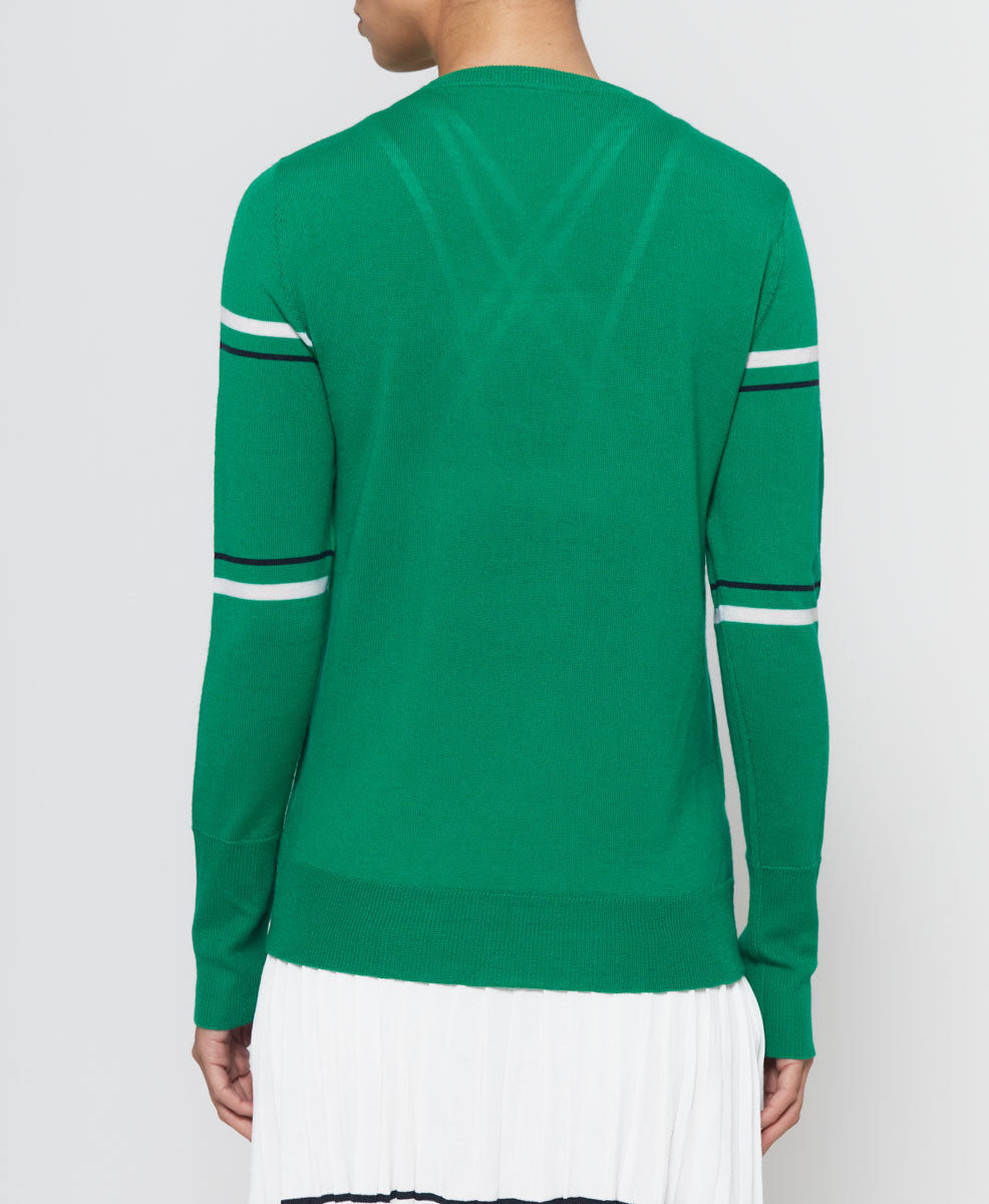 Model wearing L'Etoile Sport Green Racquet Sweater on Tennisdujour.com.
