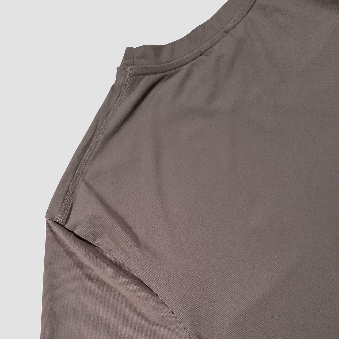 Sigrún match tee in gray back neck view.
