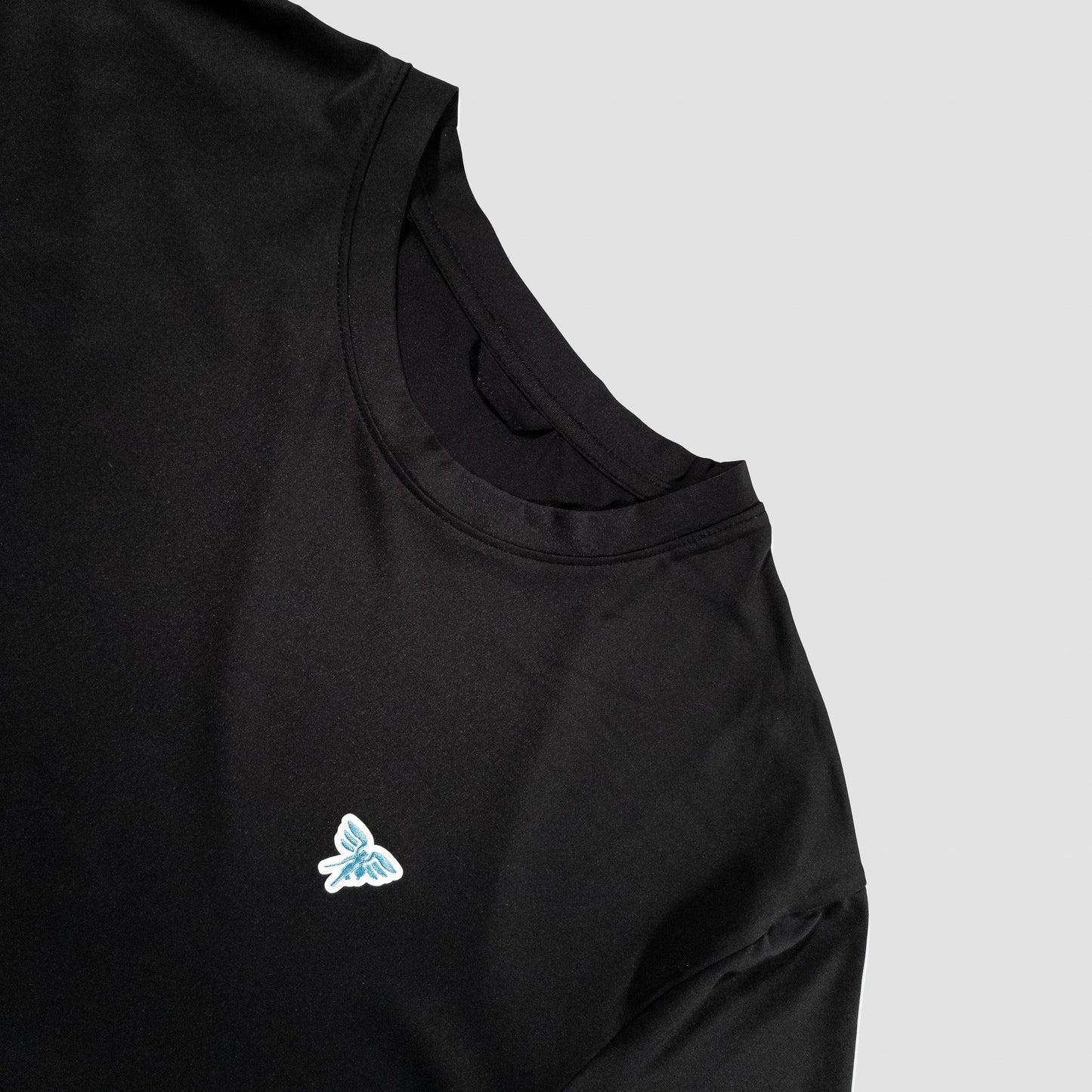 Sigrún match tee in black logo view.