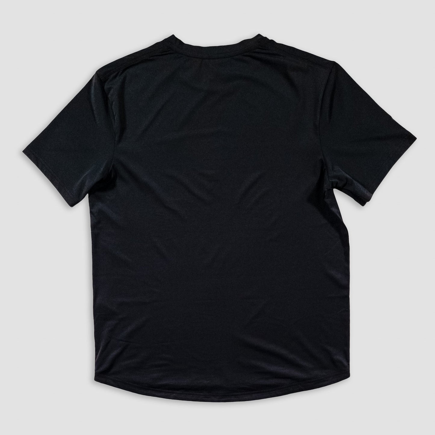 Sigrún match tee in black back view.