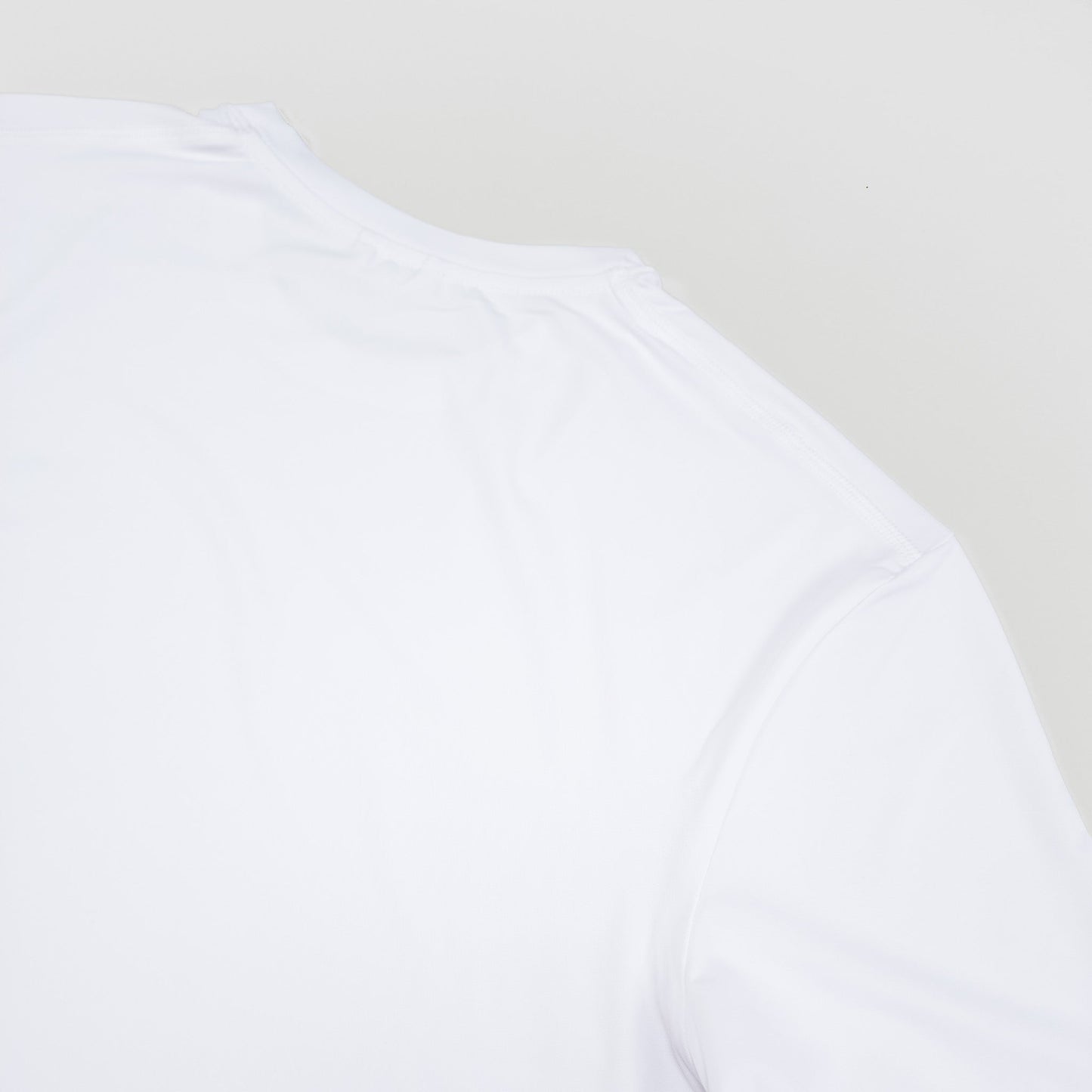 Sigrún white match tee back view.