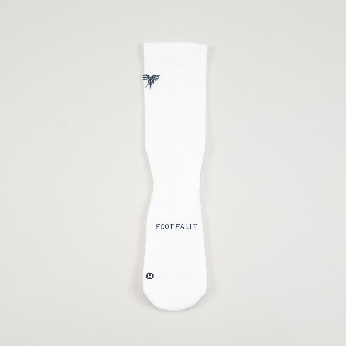 Sigrún tennis socks in white with foot fault on them.