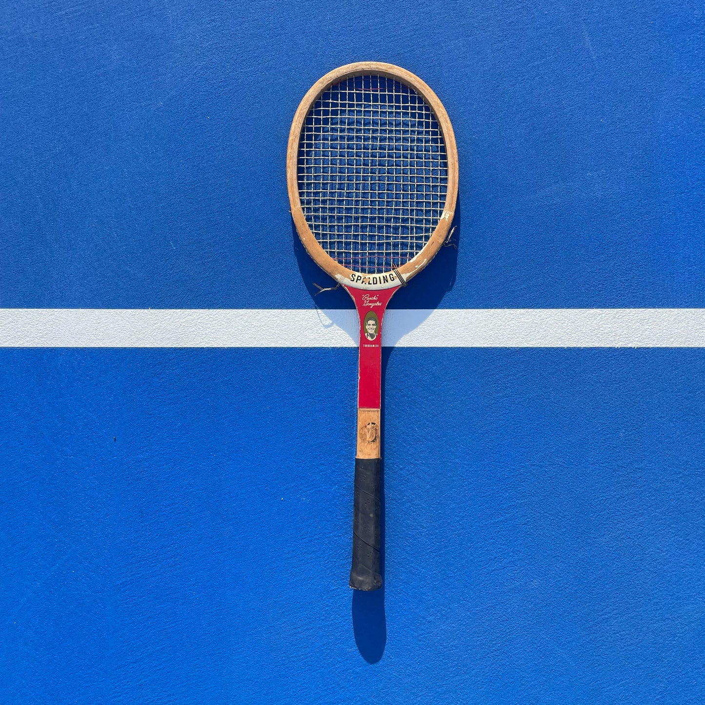 Pancho Gonzales edition Spalding wooden tennis racquet.
