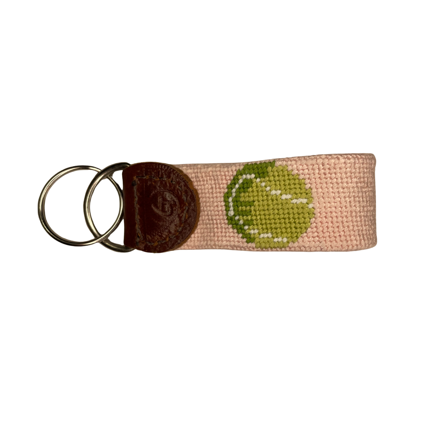Light pink needlepoint keychain with lime green tennis ball by Good Threads and TennisDuJour.