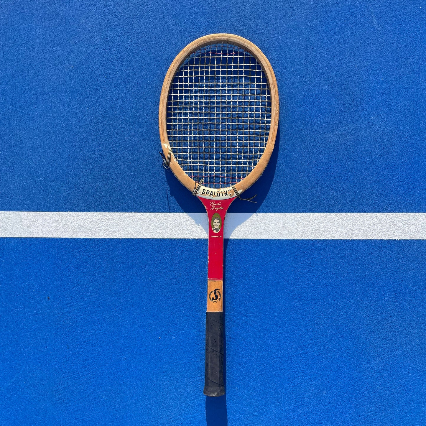 Pancho Gonzales edition Spalding wooden tennis racquet.