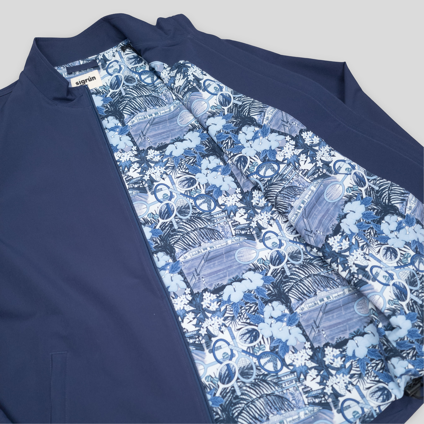 Sigrún navy tennis jacket inside view.