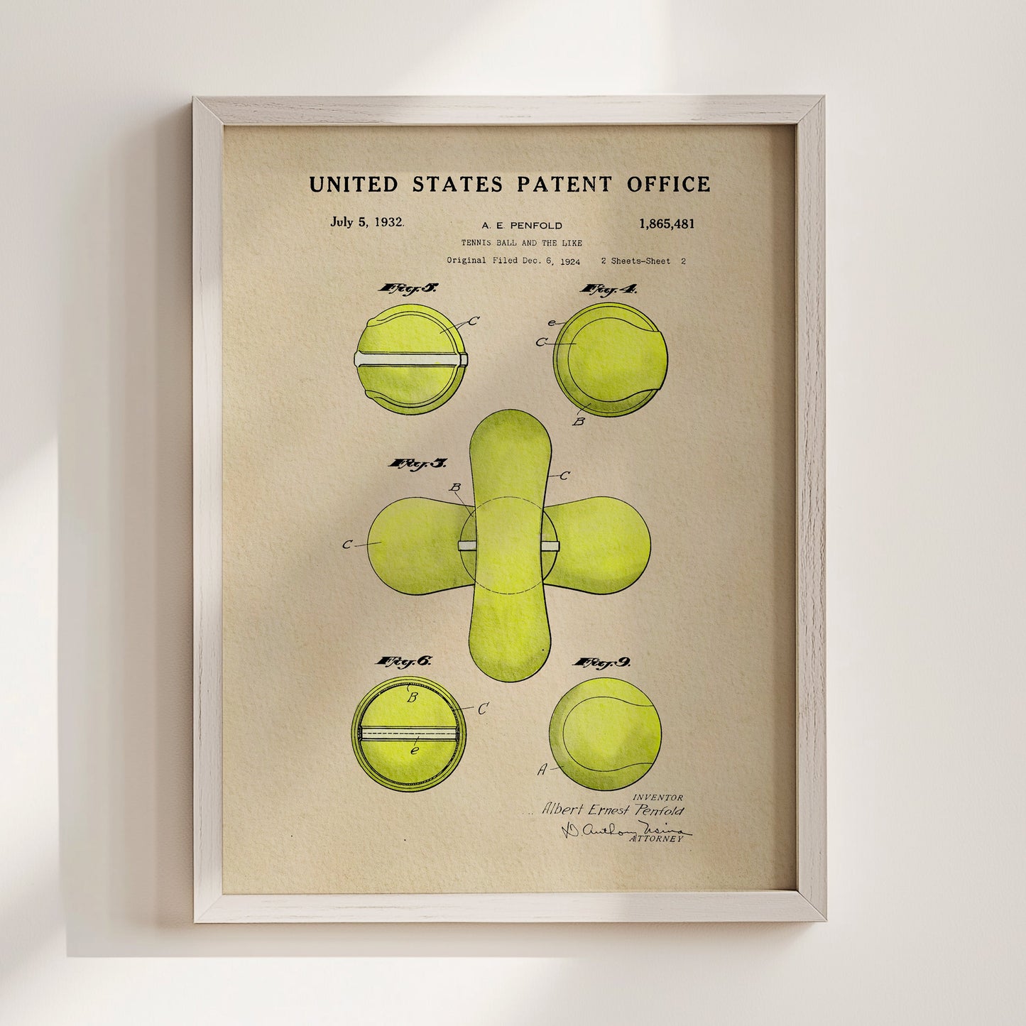 Framed United States Patent Office poster with green tennis ball diagrams on beige background