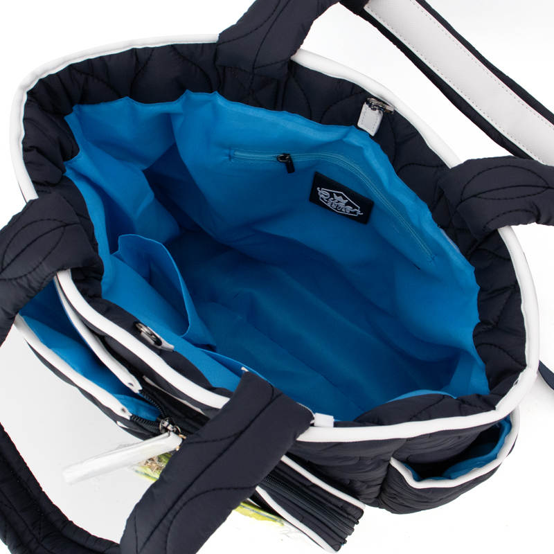 Close-up of a blue interior of a bag with visible branding on a white background