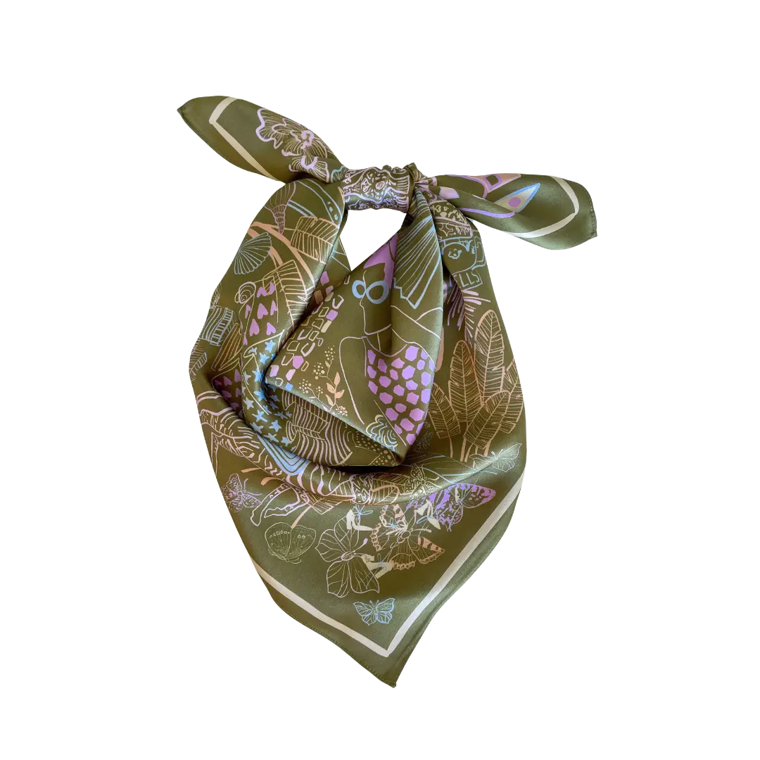 Swells Green patterned scarf with a knot on a white background