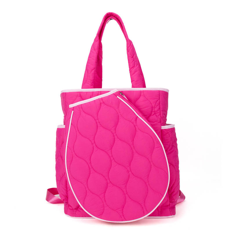 Pink quilted tennis tote bag with white zipper on a white background