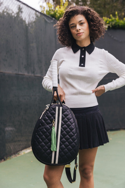 Model carrying the ace & Carry tennis bag by Trelle on TennisDuJour.com