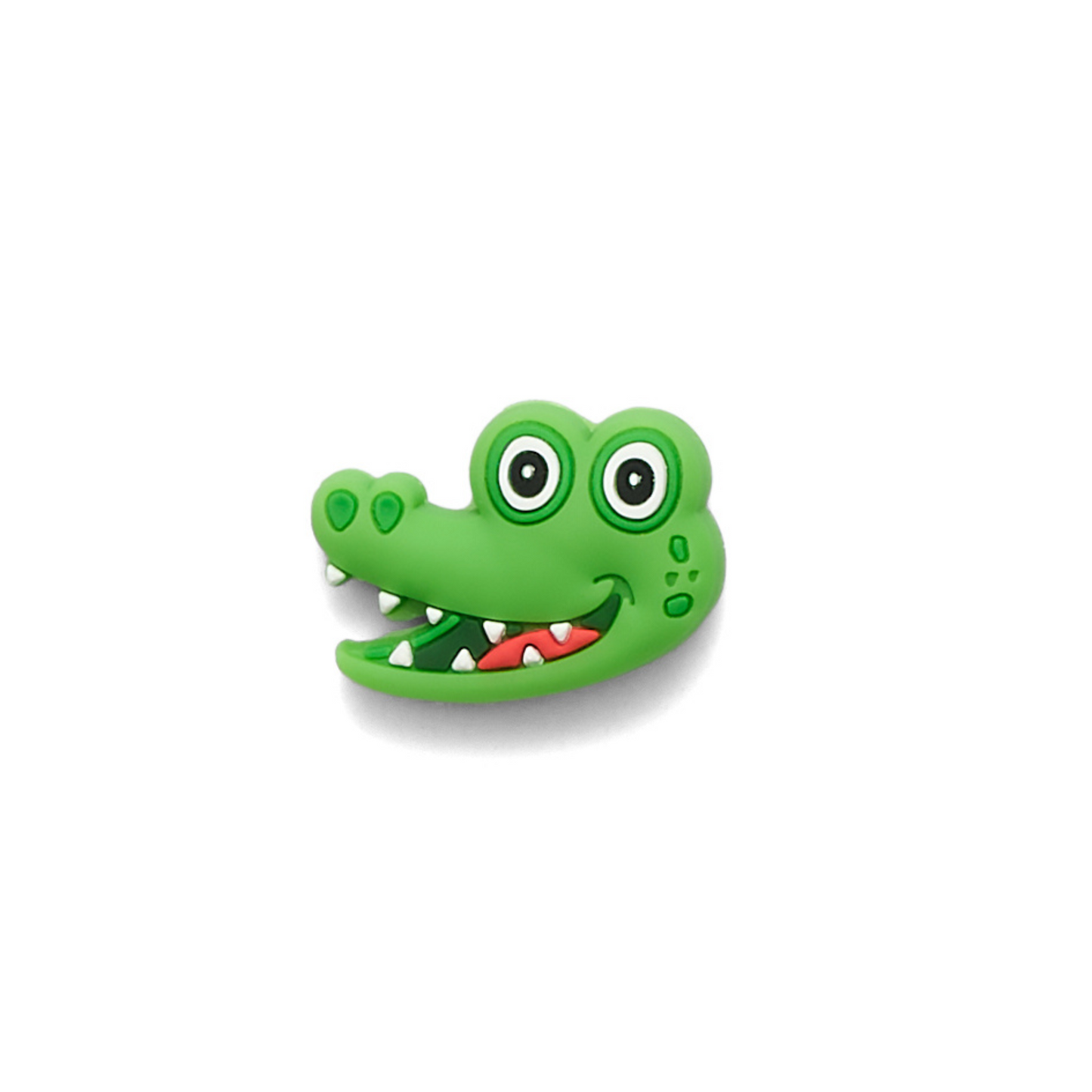 Green alligator-shaped object on a white background