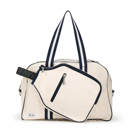 Beige tennis bag with navy accents on a white background