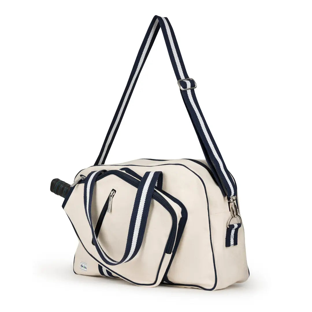 White pickleball bag with navy accents on a white background