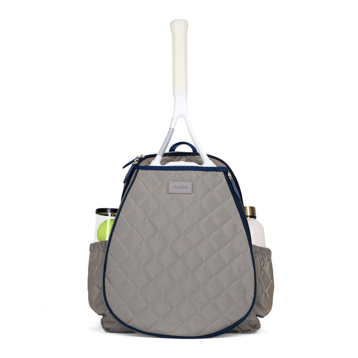 Gray tennis backpack with racquet and tennis balls on white background. 