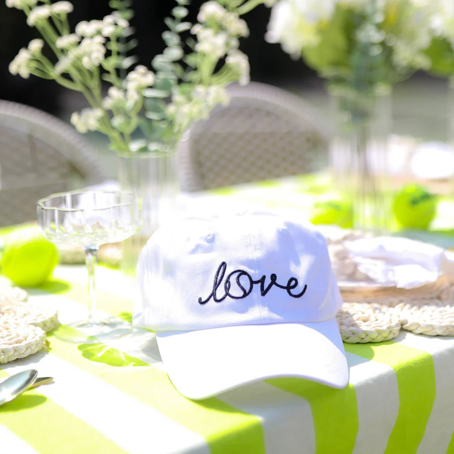 White tennis hat with love on it by Ame & Lulu on TennisDuJour