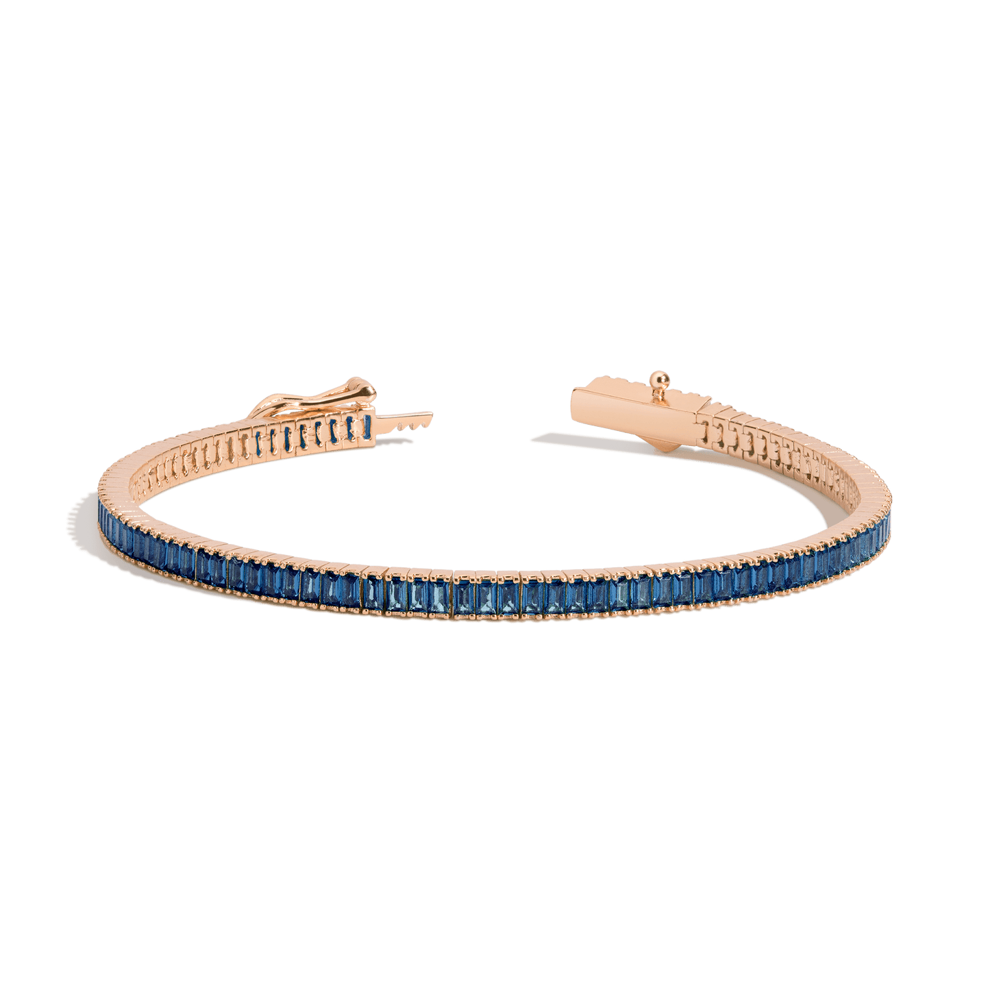 Rose gold bracelet with blue gemstones on a transparent background