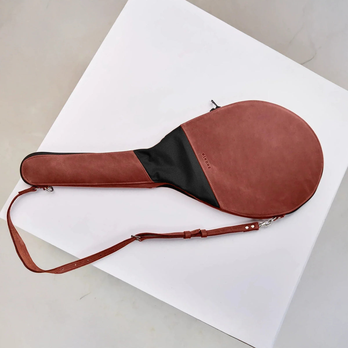 Two tone eather tennis racquet bag.
