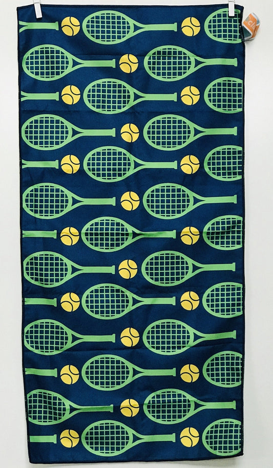 Towel with tennis racket and ball pattern on a blue background