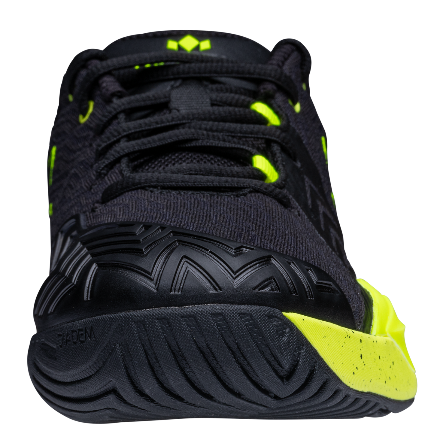 Black and yellow athletic shoe on a white background
