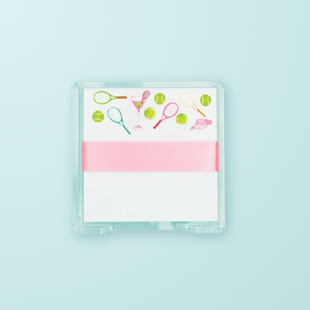 Notebook with tennis-themed design on a light blue background