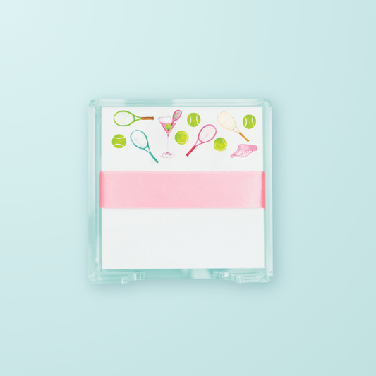 Notebook with tennis-themed design on a light blue background