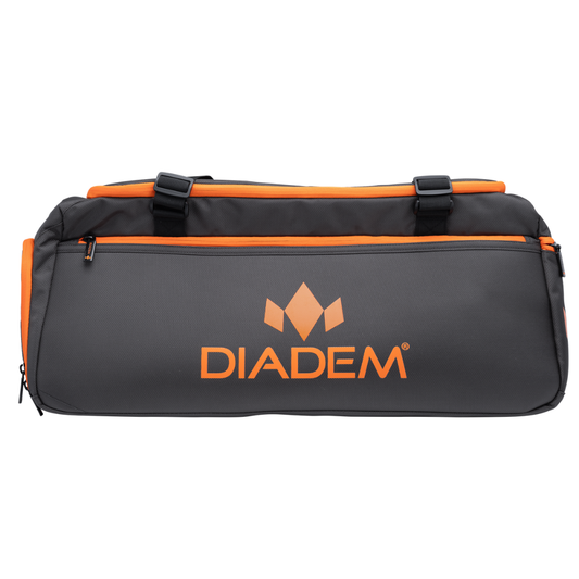 Black and orange duffel bag with Diadem logo on a white background