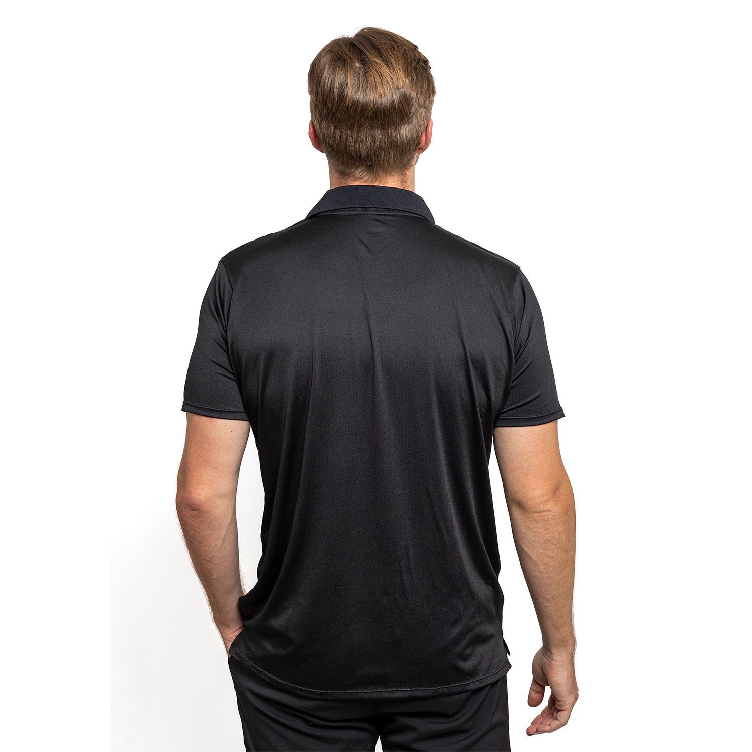 Man wearing a black polo shirt on a white background