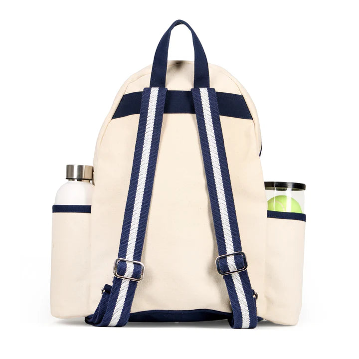 Beige backpack with navy straps and a water bottle on a white background