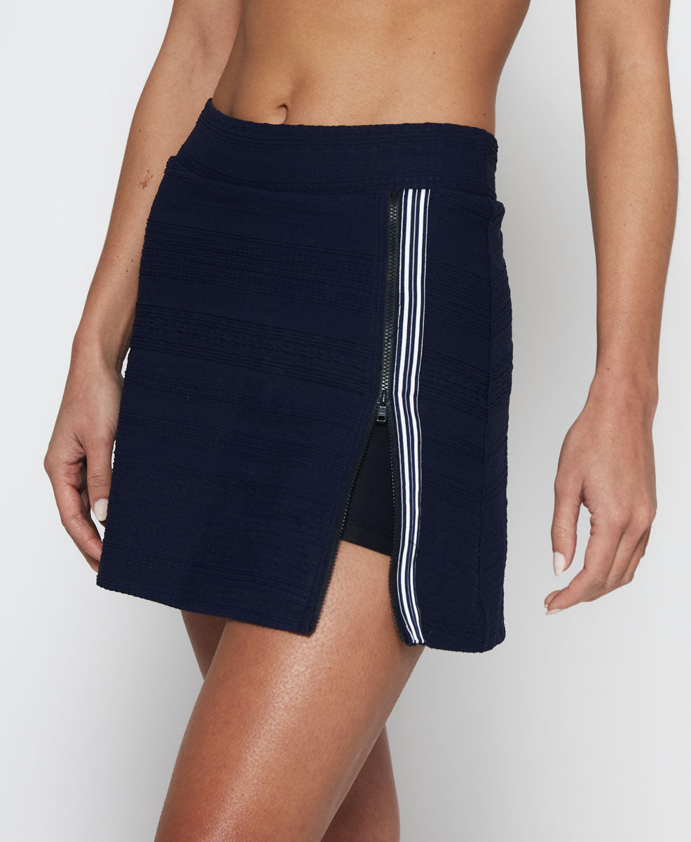 L'Etoile Sport navy side zip tennis skirt on TennisDuJour.com.