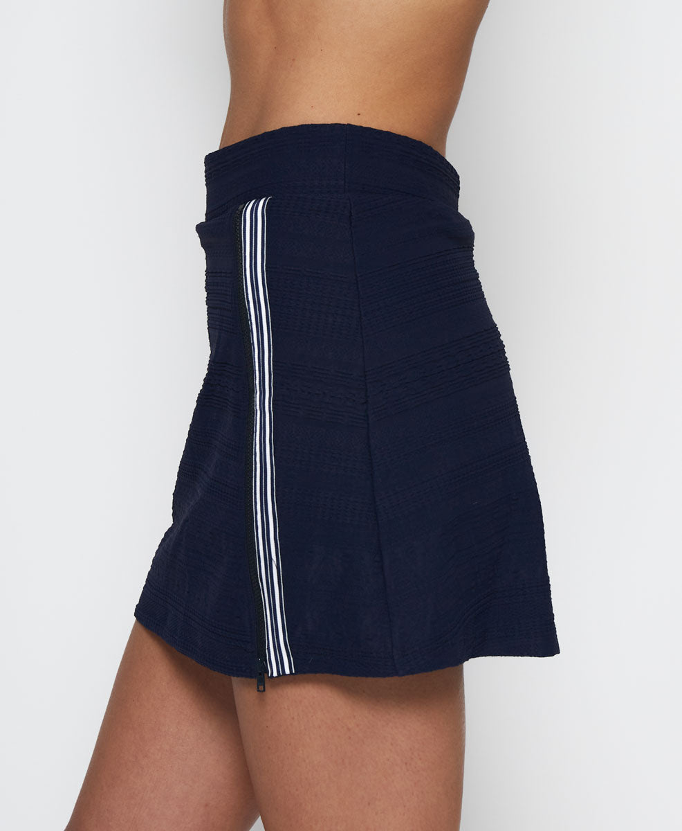 L'Etoile Sport navy side zip tennis skirt on TennisDuJour.com.