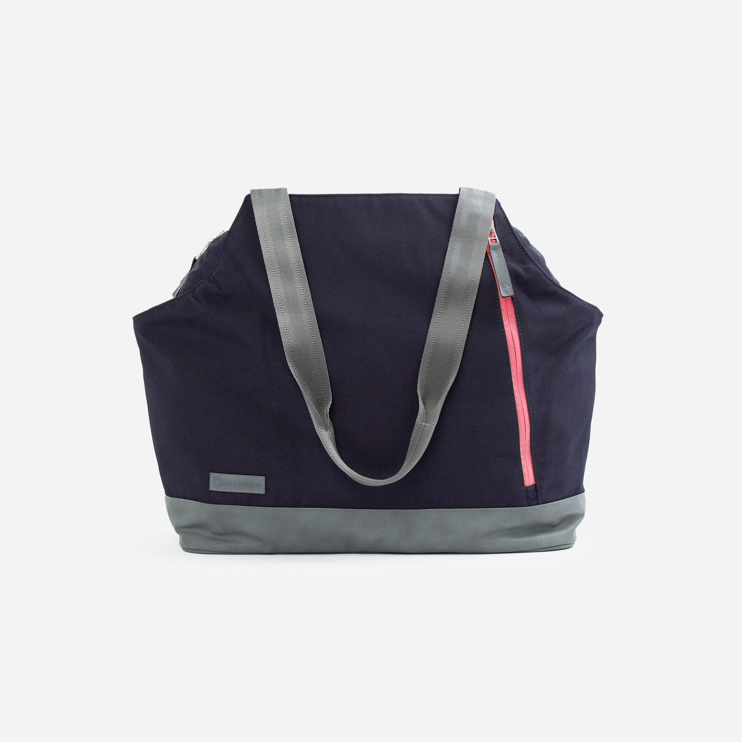 Navy blue tennis tote bag with reflective straps and a pink zipper on a white background