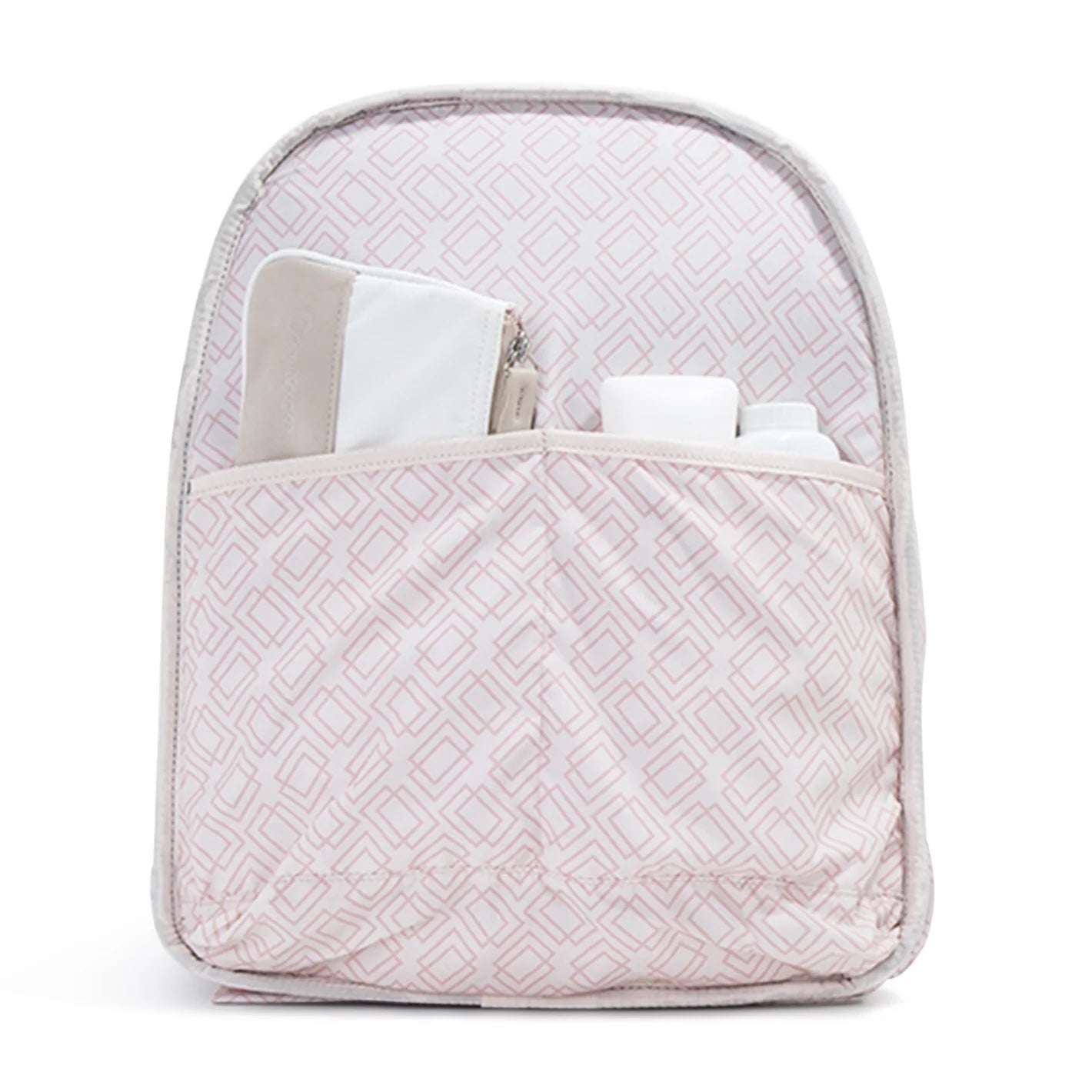 Pink quilted Doubletake tennisbackpack with patterned design on a white background