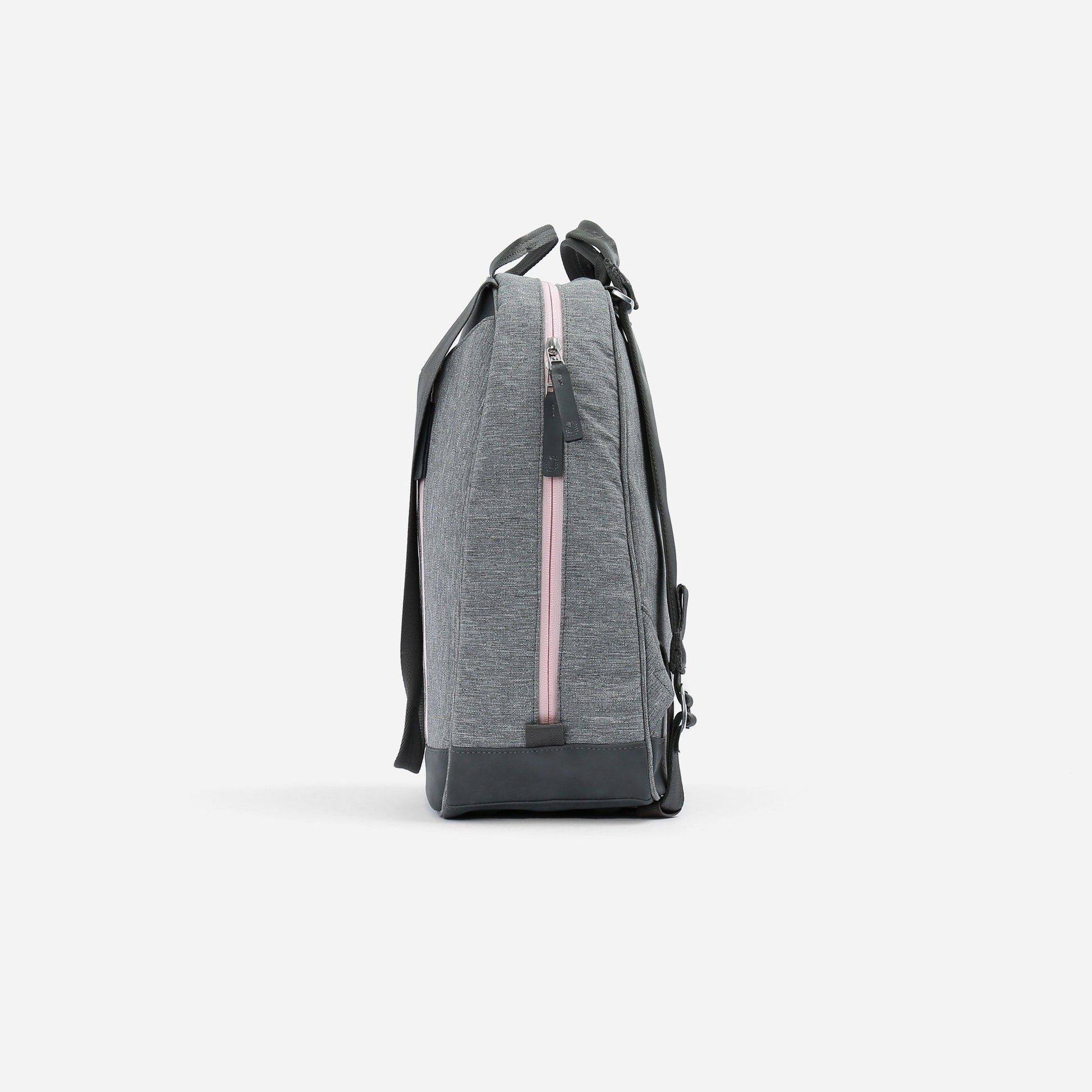 Gray Doubletake tennis backpack with a pink zipper on a white background