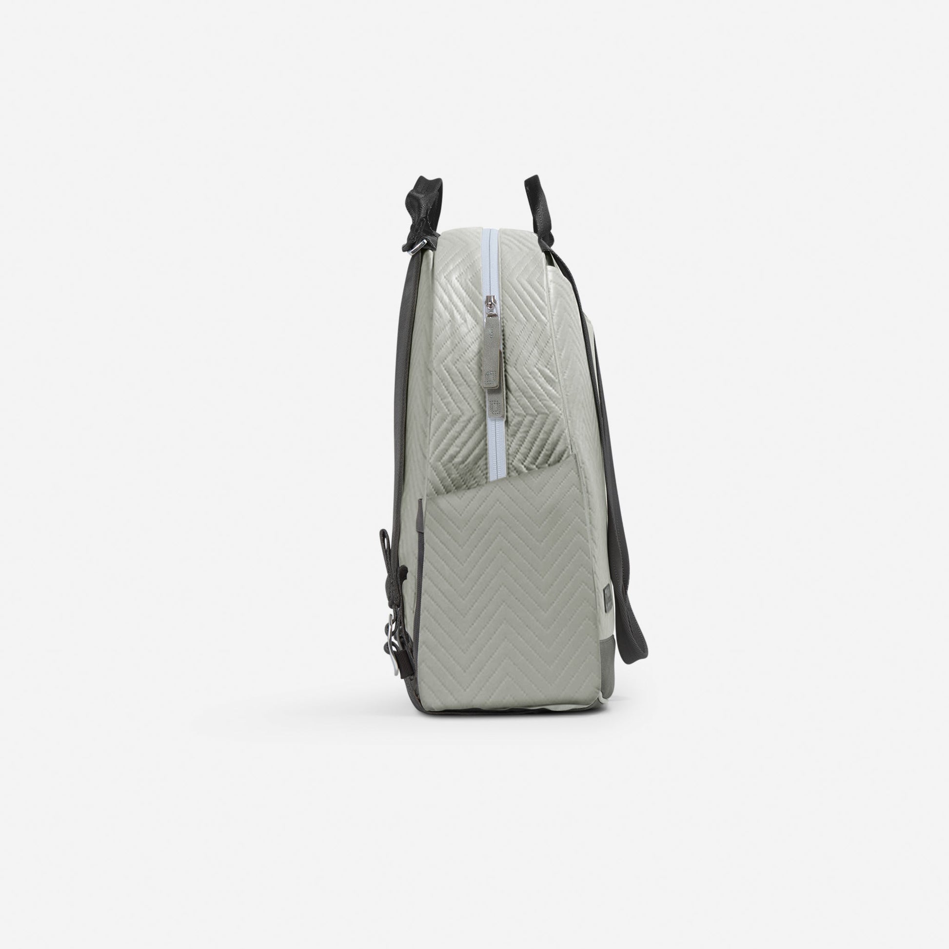 Light gray Doubletake tennis backpack with quilted pattern on a white background
