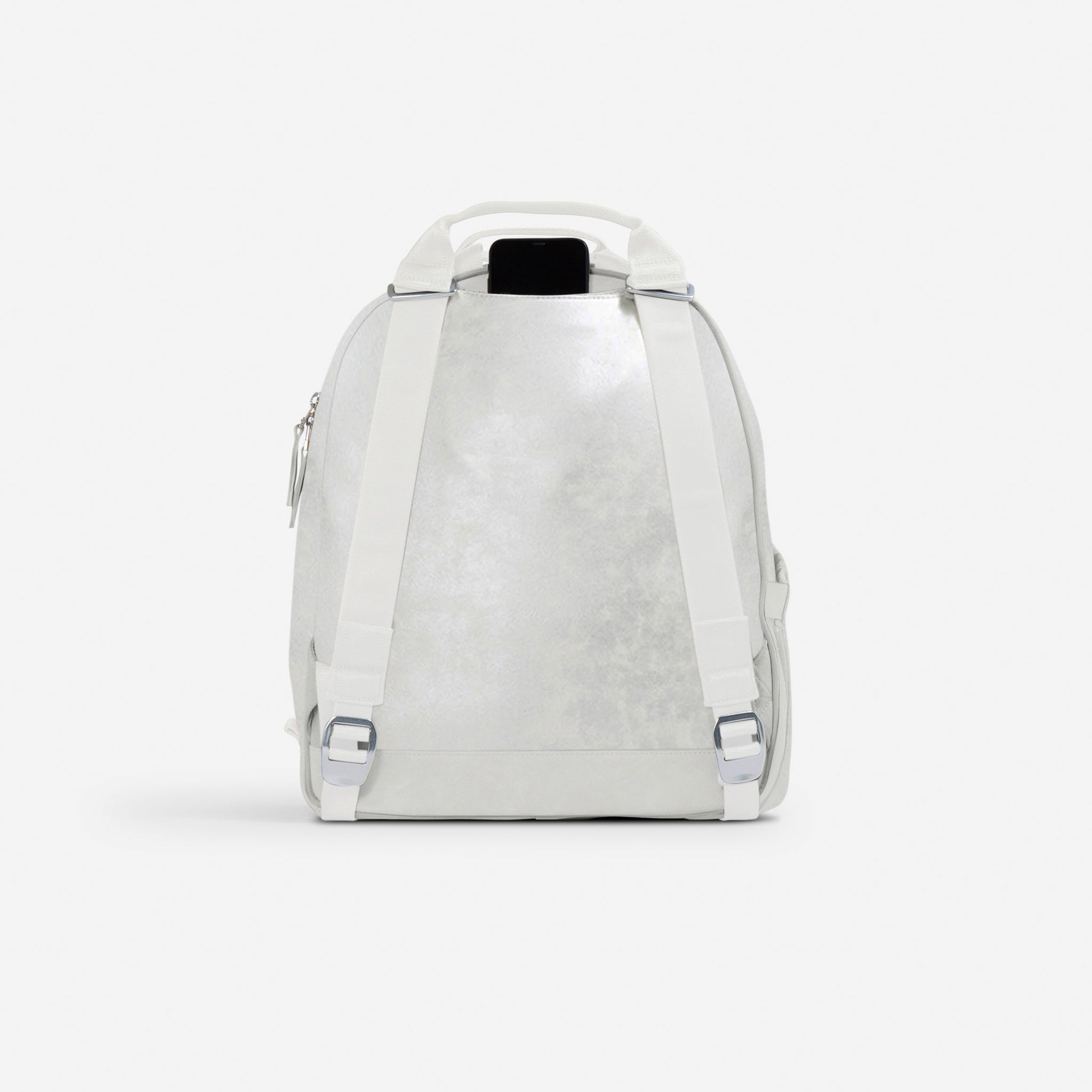 White Doubletake tennis backpack on a light gray background