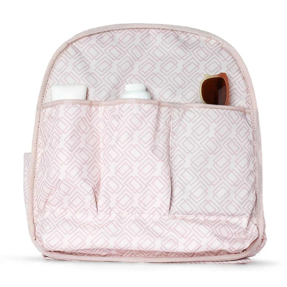 Pink  Doubletake tennis  quilted backpack with multiple pockets on a white background