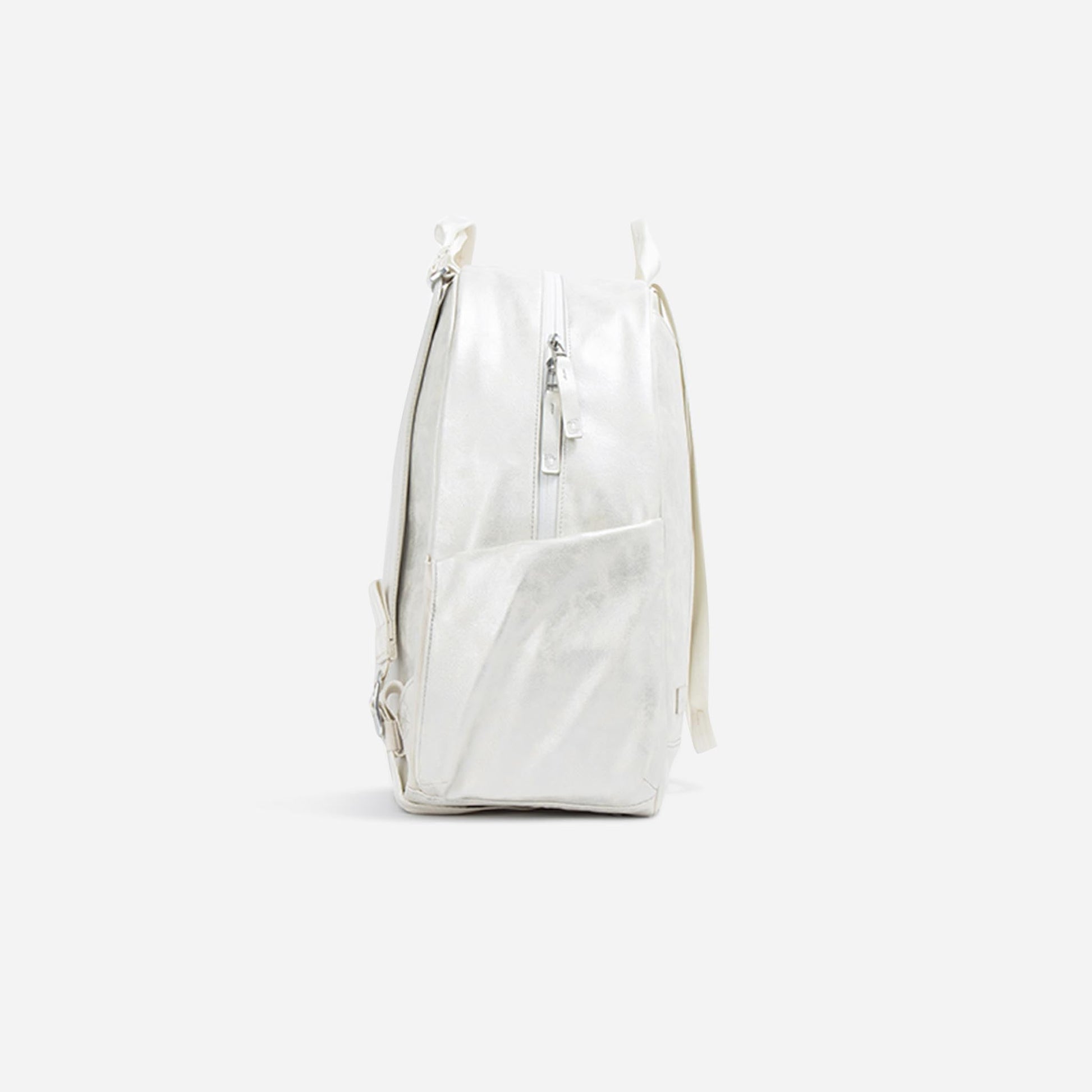 White  Doubletake tennis backpack on a light gray background