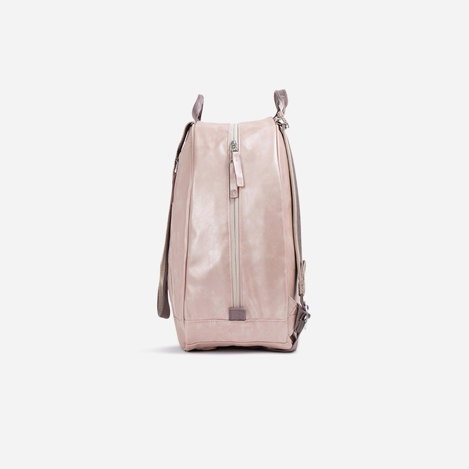 Pink  Doubletake tennis backpack on a light gray background