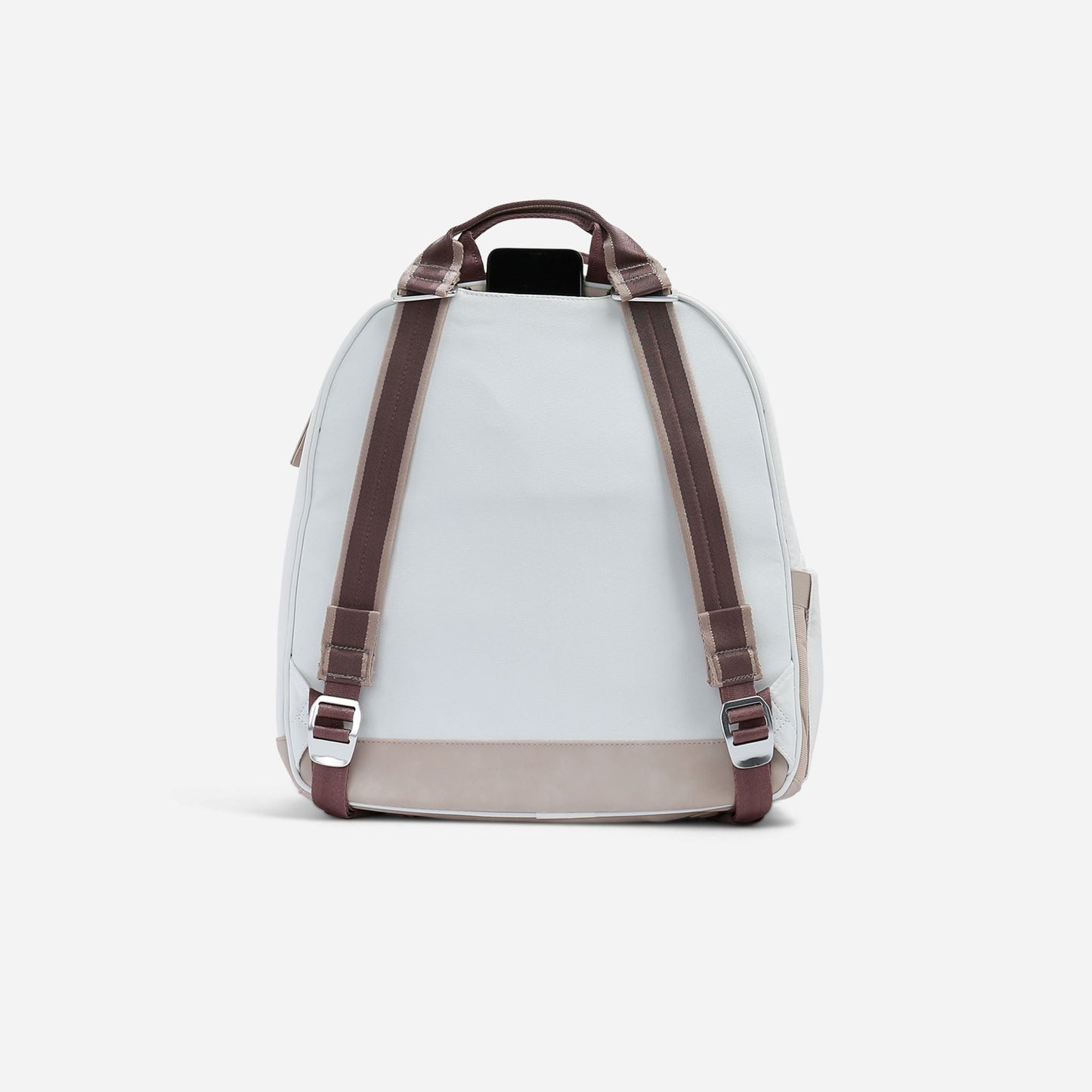 White  Doubletake tennis backpack with brown straps on a light gray background
