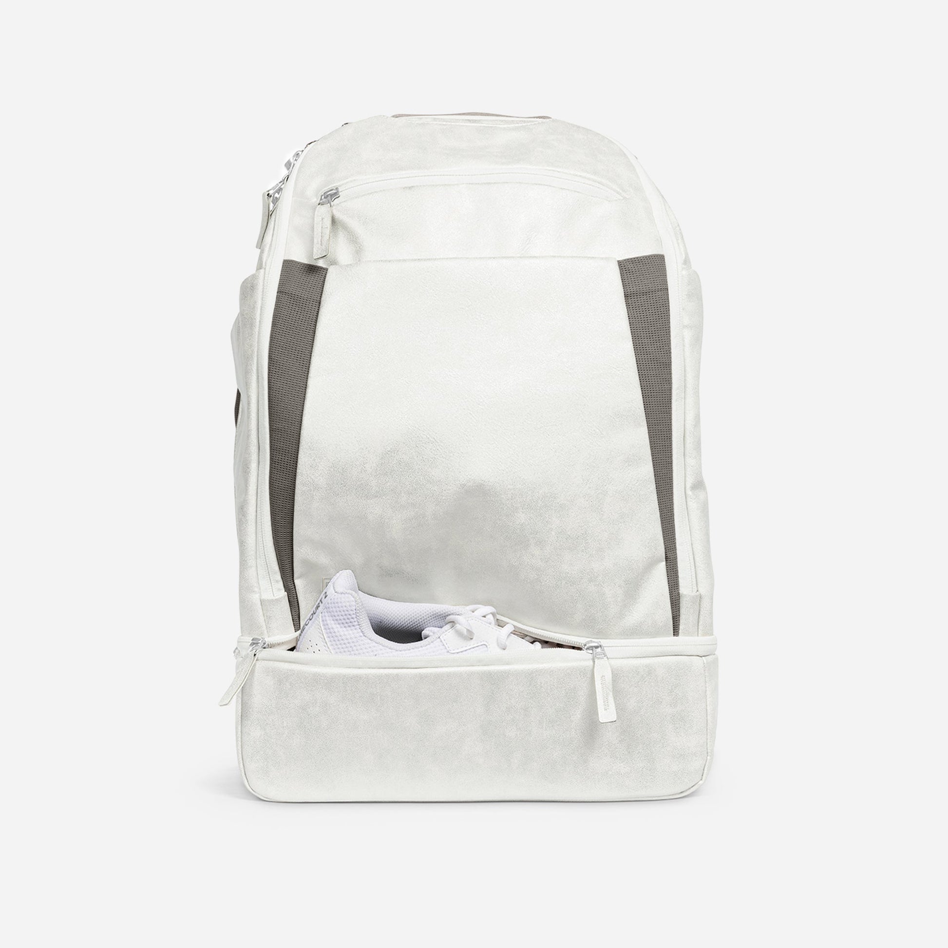 White Doubletake tennis backpack with a shoe compartment on a white background