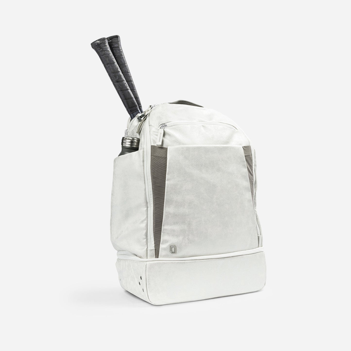 White Doubletake tennis backpack with gray accents holding tennis rackets on a white background