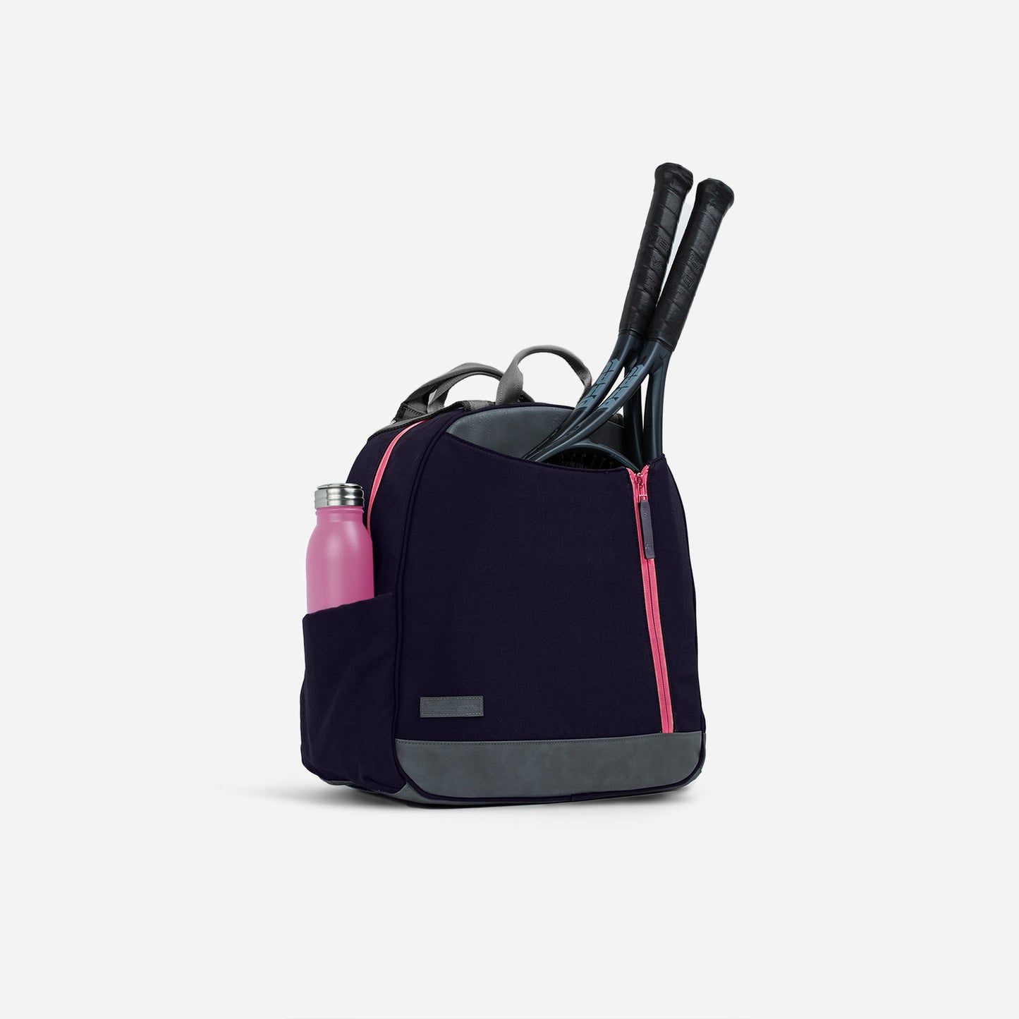 Black  Doubletake tennis backpack with pink accents, holding a water bottle and tennis rackets on a light gray background