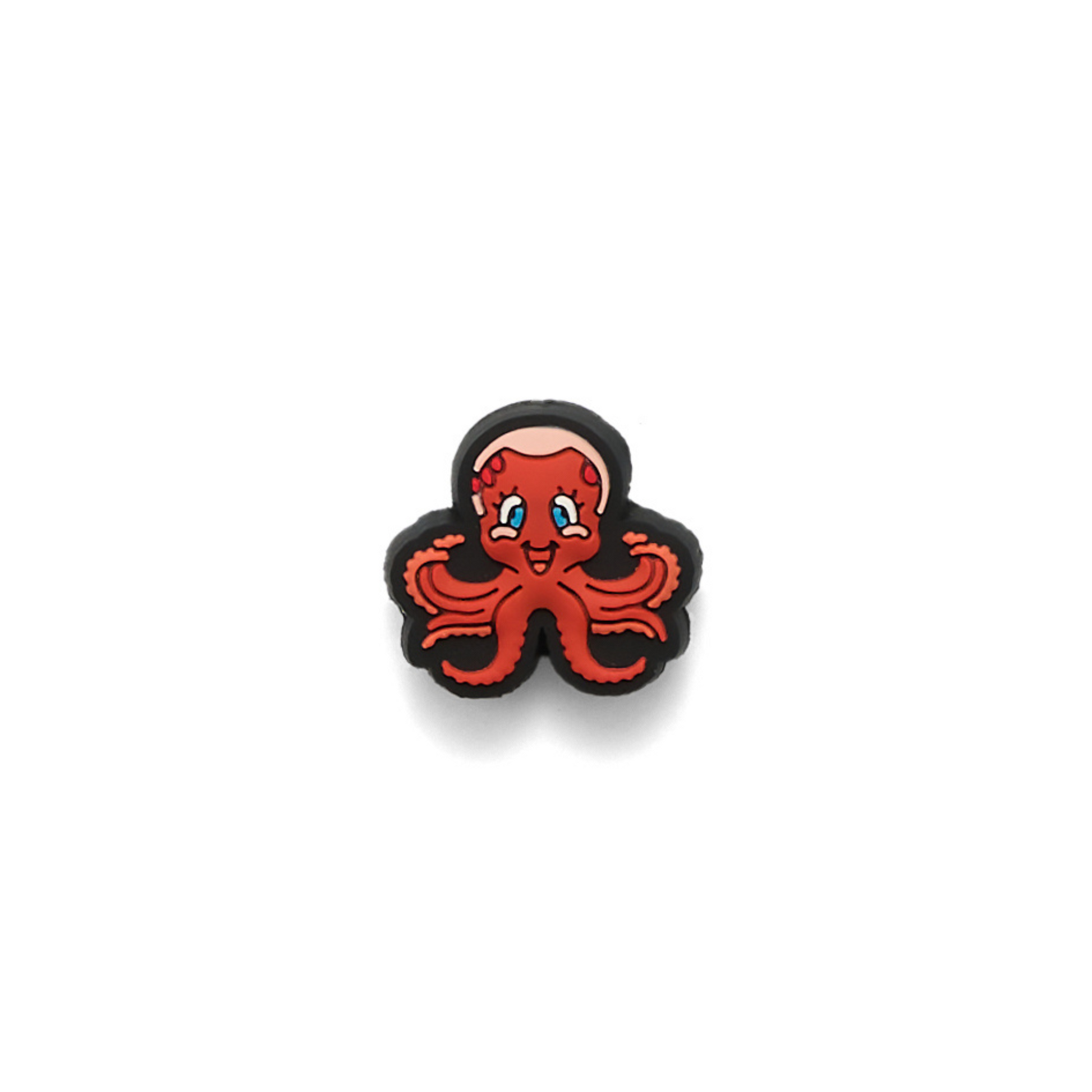 Red octopus charm on a white background