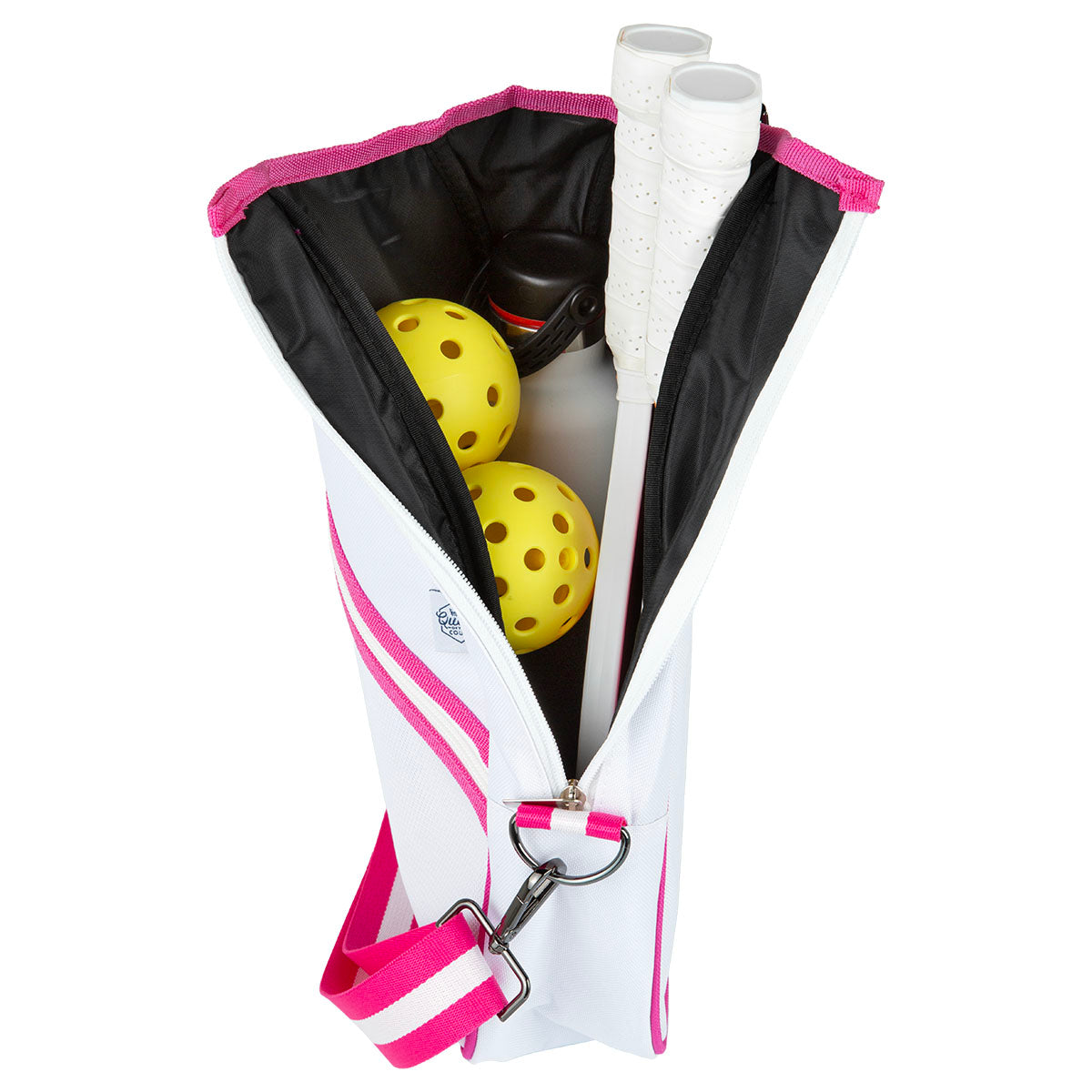 White and pink pickleball bag with yellow balls and white paddles inside on a white background