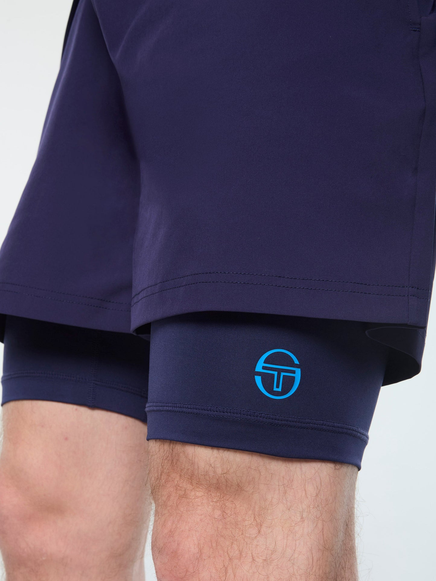 Navy shorts with a blue logo on a white background