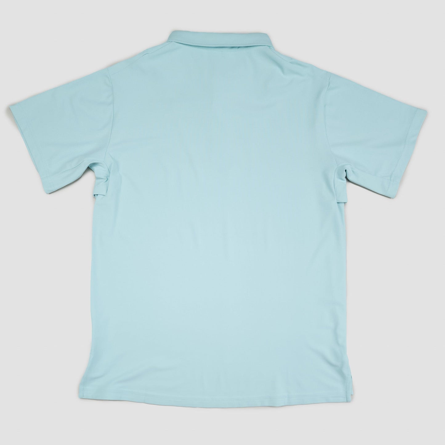 Light blue polo shirt on a white background